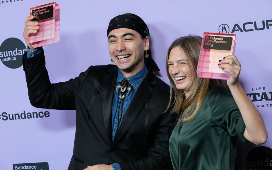 Julian Brave Noisecat and co-director Emily Kassie receive awards at the Sundance Film Festival