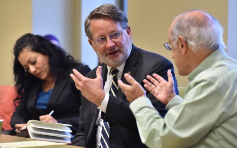 U.S. Senator Gary Peters (D-MI) at a roundtable hosted by the Ford School and shown here with Shobita Parthasarathy and Bob Axelrod.